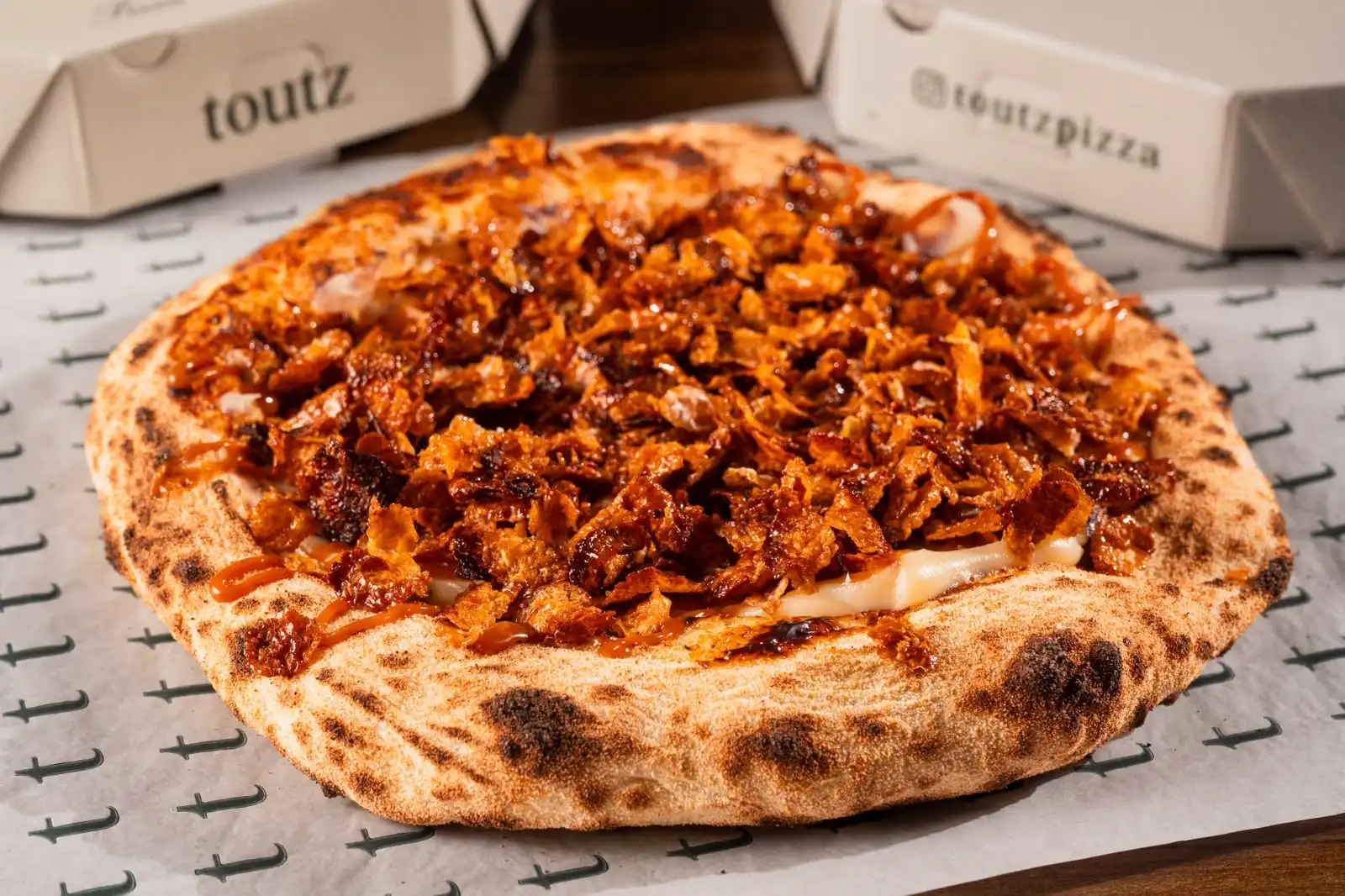 Imagem de Toutz Pizza e Falka Confeitaria anunciam collab especial para o Dia da Pizza